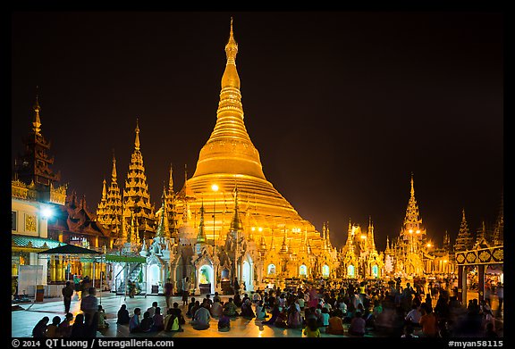 Praying from the Victory Ground, Shwedagon Pagoda, night. Yangon, Myanmar (color)