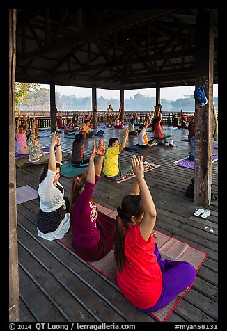 Women exercising in pavillion on Kandawgyi lake. Yangon, Myanmar (color)