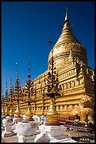 Umbrellas and main stupa, Shwezigon Pagoda. Bagan, Myanmar