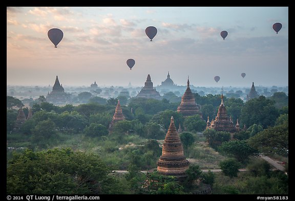 Hot air ballons above temples at sunrise. Bagan, Myanmar