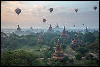 Hot air ballons above temples at sunrise. Bagan, Myanmar