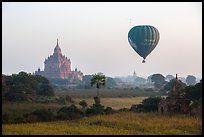 Hot air ballon and Thatbyinnyu temple. Bagan, Myanmar