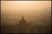 Aerial view of backlit temple in mist. Bagan, Myanmar