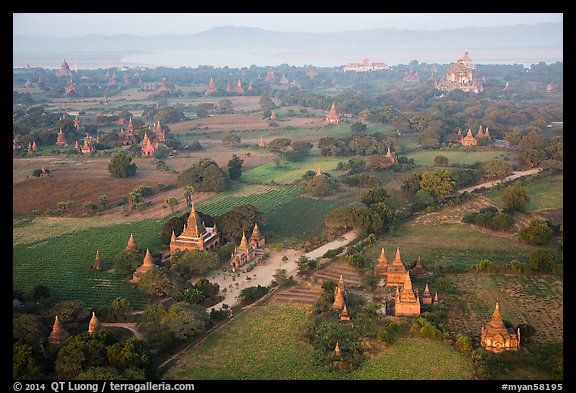 Aerial view of many temples set amongst fields. Bagan, Myanmar