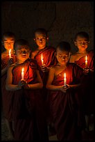 Group of buddhist novices holding candles. Bagan, Myanmar ( color)