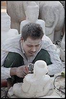 Sculptor with face covered in fine marble dust. Mandalay, Myanmar ( color)