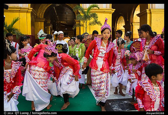 Young girls during novitiation, Mahamuni Pagoda. Mandalay, Myanmar (color)