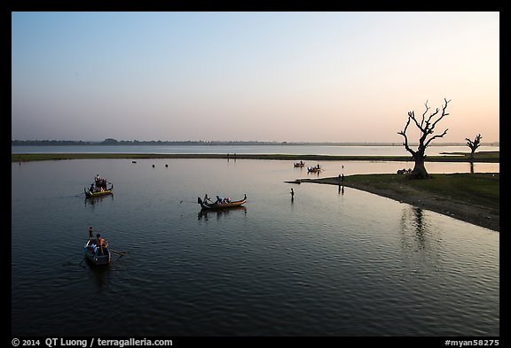 Tree skeletons and boats, Taungthaman Lake. Amarapura, Myanmar (color)