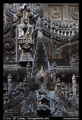 Intricate teak carving, Shwe In Bin Kyaung pagoda. Mandalay, Myanmar (color)