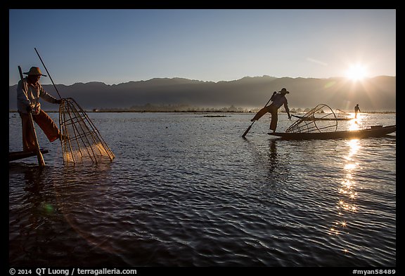 Intha fishermen and sun. Inle Lake, Myanmar (color)