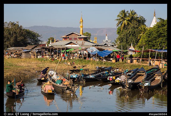Villagers arriving by boat at market. Inle Lake, Myanmar (color)