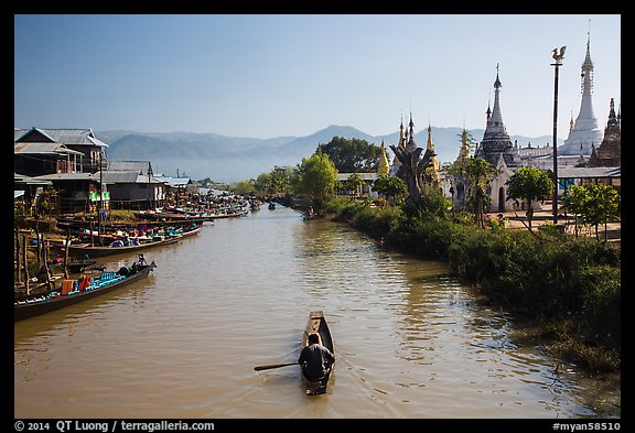 Boats and stupas bordering Ywama Village canal. Inle Lake, Myanmar (color)
