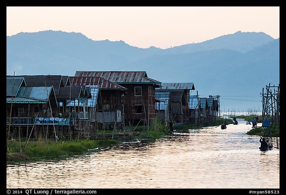 Houses and canal at sunset, Maing Thauk Village. Inle Lake, Myanmar (color)