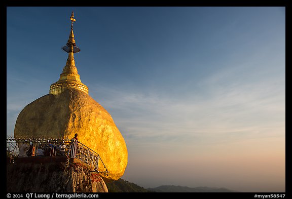Golden Rock and monk, late afternoon. Kyaiktiyo, Myanmar (color)