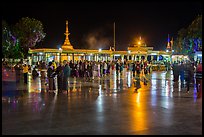 Crowds on main plaza at night. Kyaiktiyo, Myanmar ( color)
