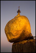 Golden rock gleaming at dawn. Kyaiktiyo, Myanmar ( color)