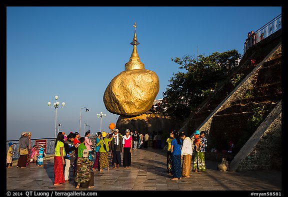 Pilgrims on platform below Golden Rock. Kyaiktiyo, Myanmar (color)
