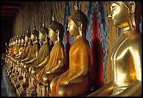 Row of Buddha figures, Wat Arun. Bangkok, Thailand (color)