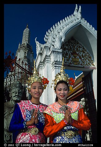 Girls in traditional thai costume, Wat Arun. Bangkok, Thailand (color)