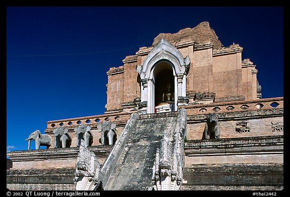 Ruined Wat Chedi Luang with elephants in the pediment. Chiang Mai, Thailand (color)
