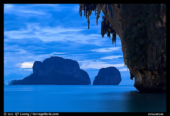 Limestone stalactite framing islets, Rai Leh. Krabi Province, Thailand (color)