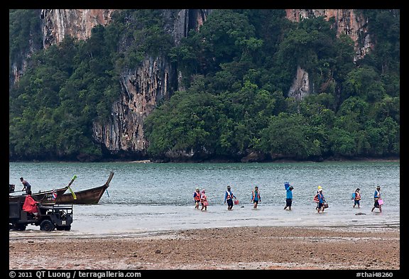 Disembarking at low tide, Rai Leh East. Krabi Province, Thailand