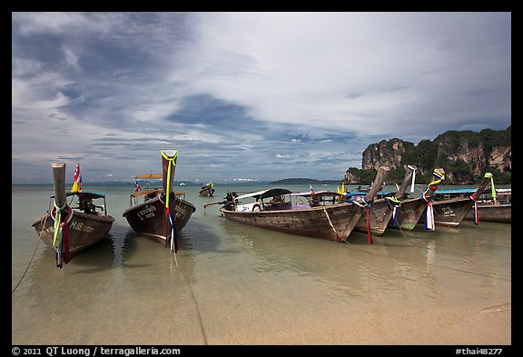 Long tail boats on beach, Hat Rai Leh West. Krabi Province, Thailand (color)