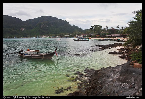 Long tail boat, and Tonsai village, Ko Phi-Phi Don. Krabi Province, Thailand (color)