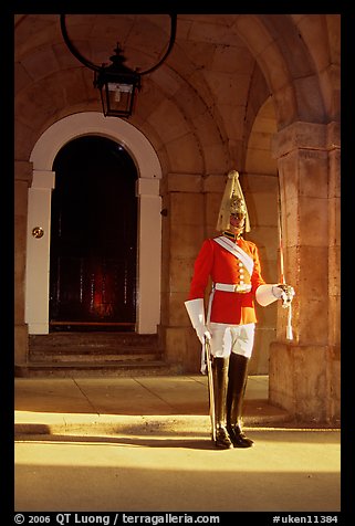 Horseguard standing in front of door. London, England, United Kingdom (color)