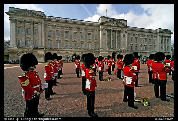 Rows of guards  wearing bearskin hats and red uniforms. London, England, United Kingdom