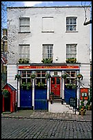 Pub the Grenadier, and cobblestone mews. London, England, United Kingdom