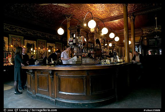 Central horseshoe bar in the 19th century victorian  pub Princess Louise. London, England, United Kingdom (color)