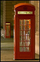Red phone booth at night. London, England, United Kingdom (color)
