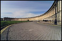 Cobblestone pavement and curved facade of Royal Crescent. Bath, Somerset, England, United Kingdom (color)