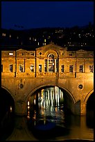 Central section of Pulteney Bridge, covered by shops,  at night. Bath, Somerset, England, United Kingdom (color)