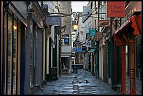 Shops lining narrow street. Bath, Somerset, England, United Kingdom