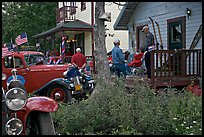 Vintage cars and houses on main street. McCarthy, Alaska, USA ( color)