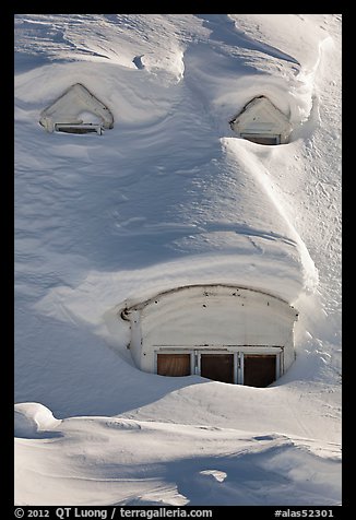 Windows on snow-covered roof. Alaska, USA