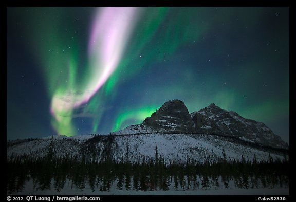 Multicolored Northern Lights above Mount Sukakpak. Alaska, USA