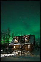 Cabin at night with Northern Lights. Wiseman, Alaska, USA (color)