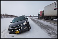 Car stuck in snow along Dalton Highway. Alaska, USA ( color)