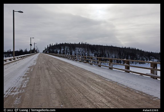Long wooden bridge across Yukon River. Alaska, USA