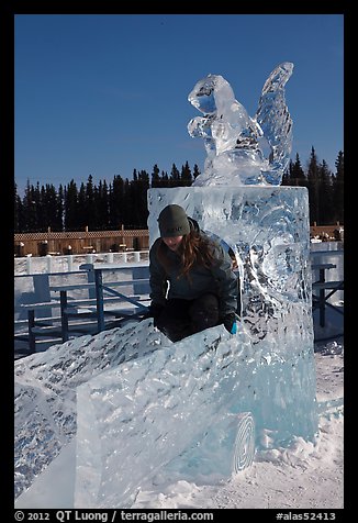 Girl on ice sculpture, George Horner Ice Park. Fairbanks, Alaska, USA (color)