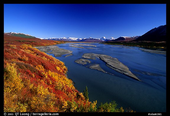 Wide river and autumn colors on the tundra. Alaska, USA