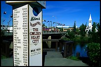 Sign showing distances to major cities on the globe in Fairbanks. Fairbanks, Alaska, USA (color)