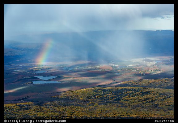 Aerial view of forest, lakes, and rainbow. Alaska, USA (color)