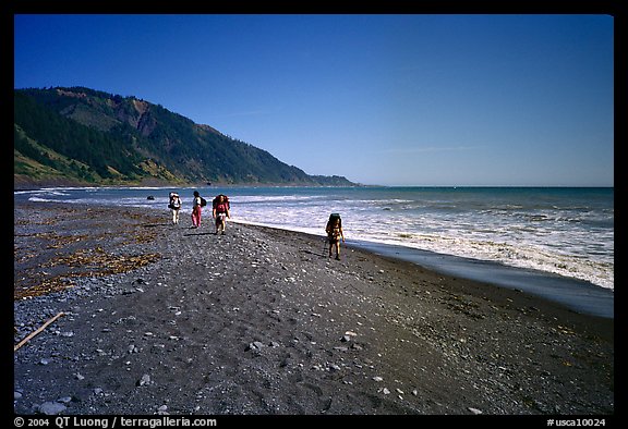 Backpacking on black sand beach, Lost Coast. California, USA (color)