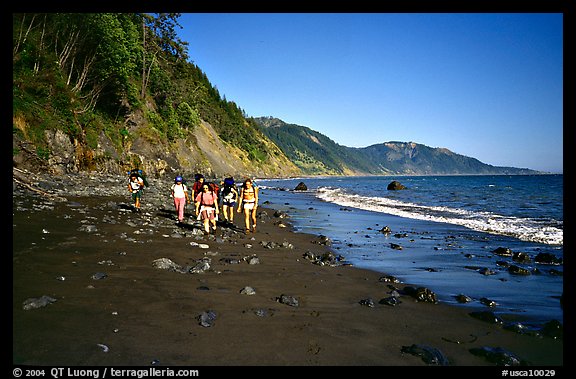 Backpackers on the beach,  Lost Coast. California, USA