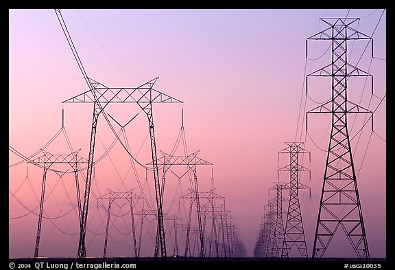 High voltage power lines at dusk. California, USA (color)
