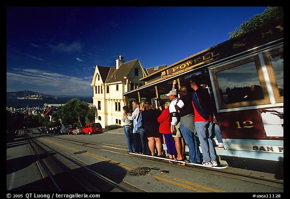 Cable car and Tudor house, Hyde Street, late afternoon. San Francisco, California, USA (color)